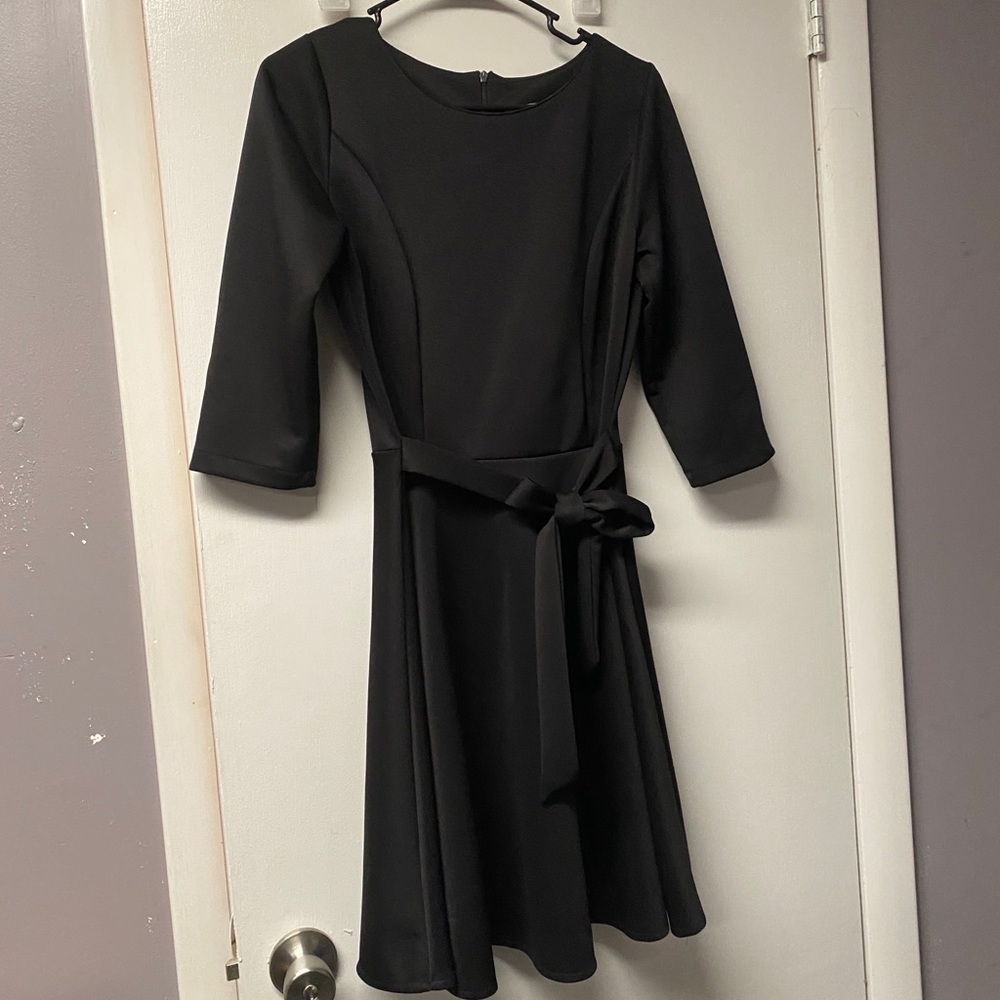 Simple black dress with bow belt detail